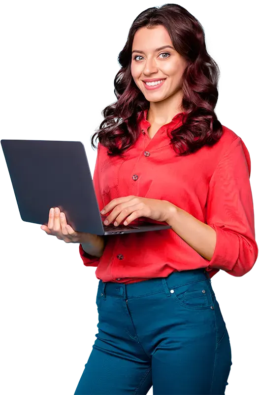 A girl standing and holding a laptop