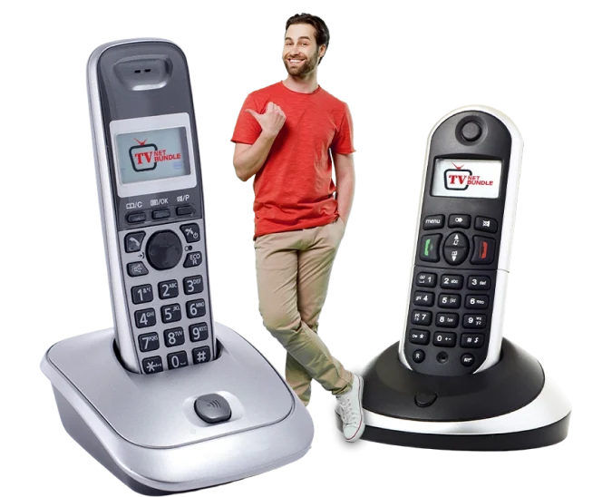 A person standing next to a pair of telephones