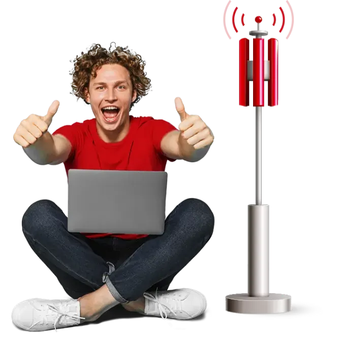 Man sitting on the floor with the laptop and satellite internet nearby.